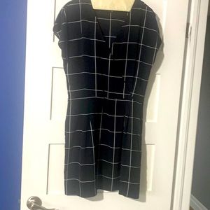 Black and white plaid summer weight dress .